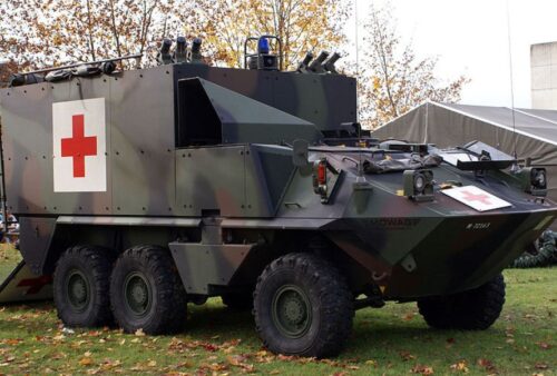 red-cross-armored-truck-in-a-yard