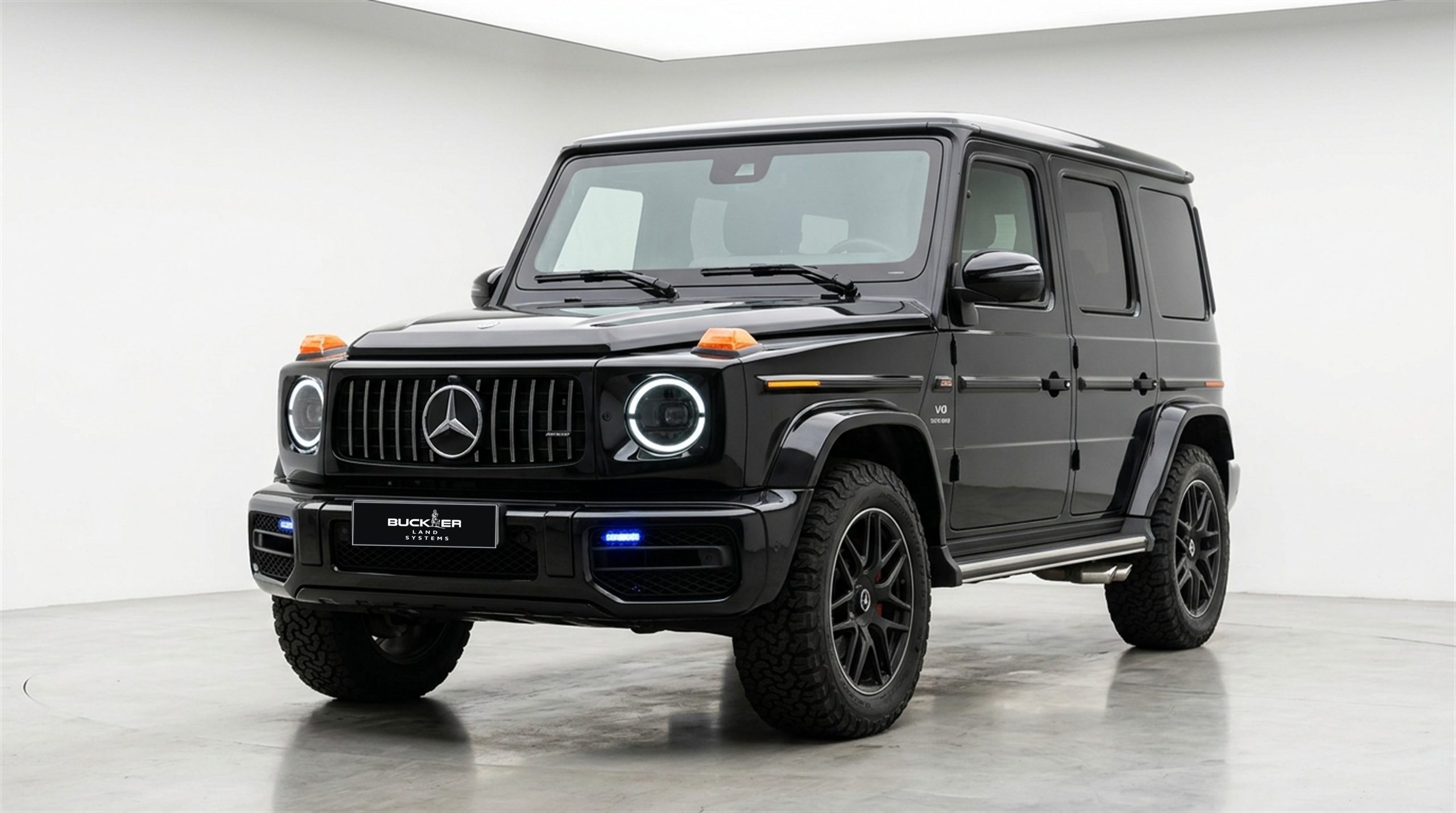 Buckler Land Systems Armoured Mercedes-Benz G-Class G63 AMG front three-quarter view with official showroom plate