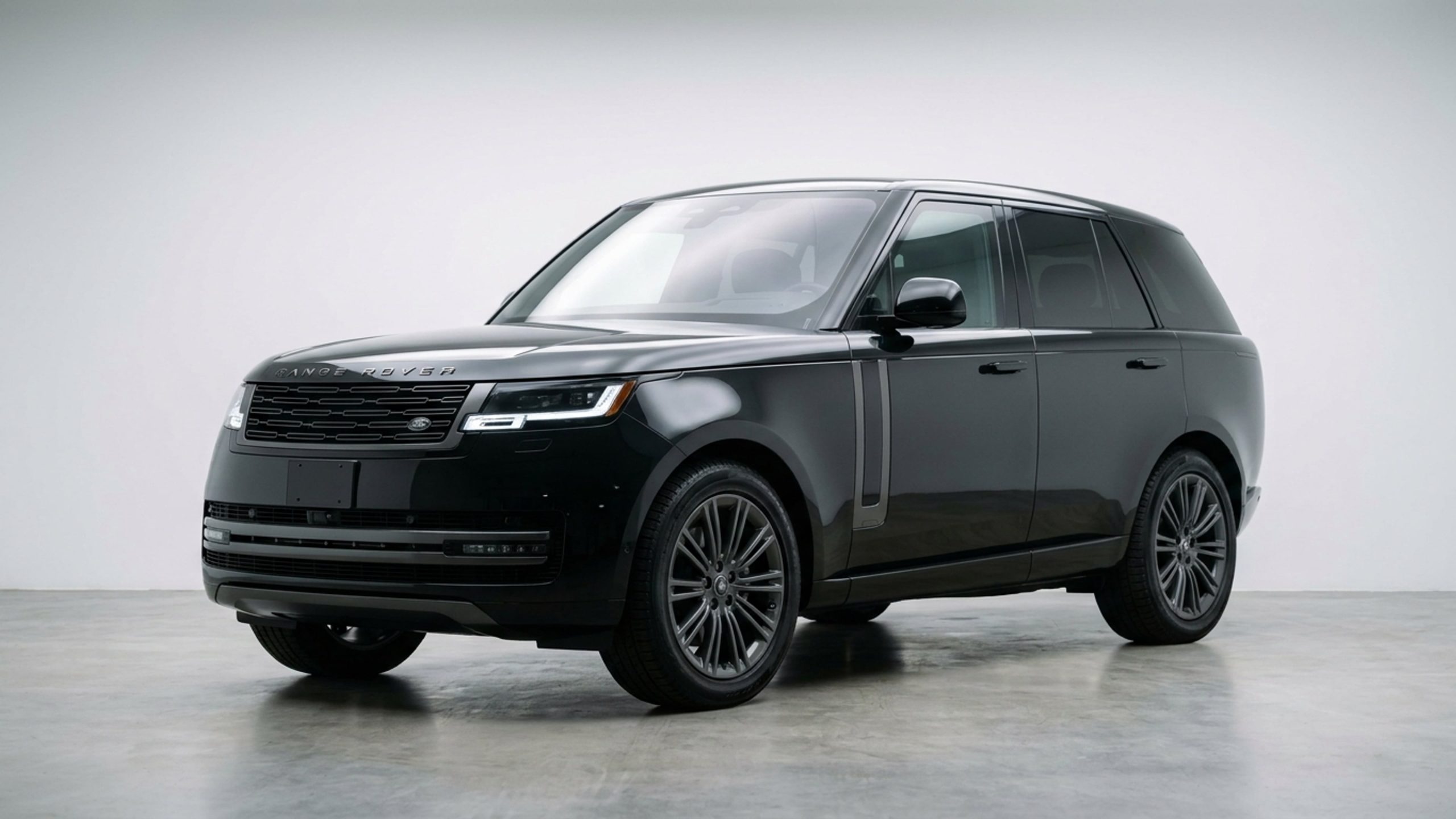 Armoured Land Rover Range Rover Autobiography front three-quarter studio photography on white infinity cyclorama